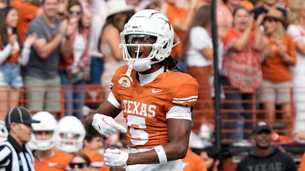 Texas Longhorns wide receiver Adonai Mitchell (5) reacts after making a catch during the second half against the Kansas State Wildcats at Darrell K Royal-Texas Memorial Stadium.